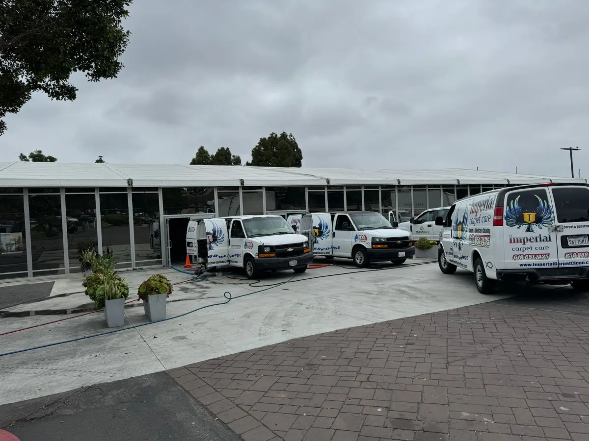 Several Imperial vans on a large commercial job