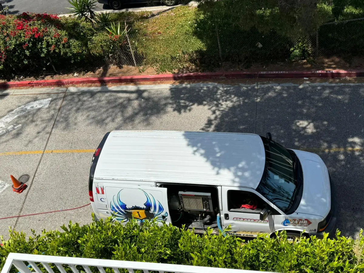 Imperial truck-mounted van with hoses run to a job