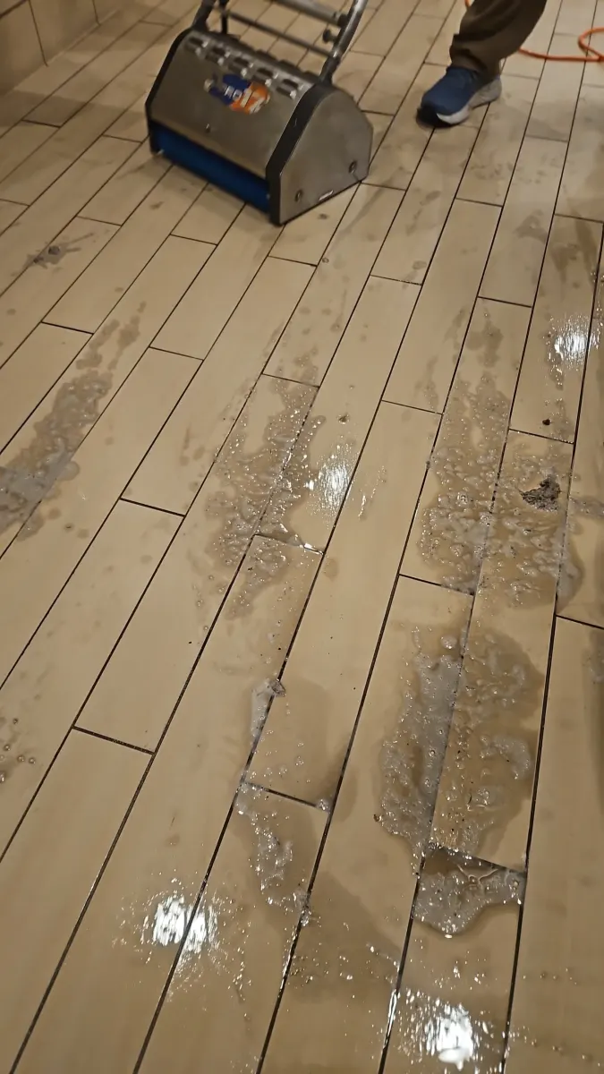 Machine scrubbing wood-look tile and grout